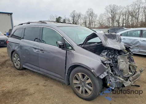 2014 Honda Odyssey Touring z USA, uszkodzony, nr VIN 5FNRL5H91EB032866